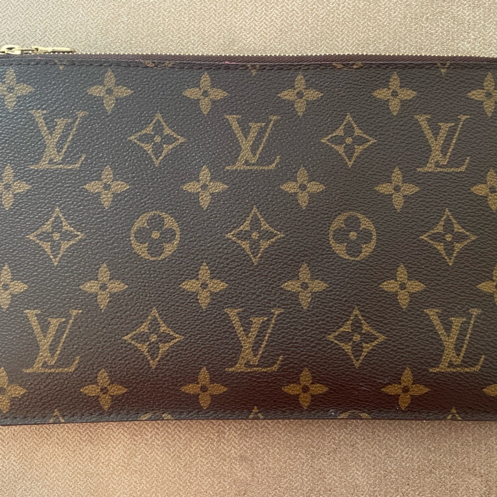 Authentic Louis Vuitton Brown & Gold Monogram Pouch. Excellent used condition.
